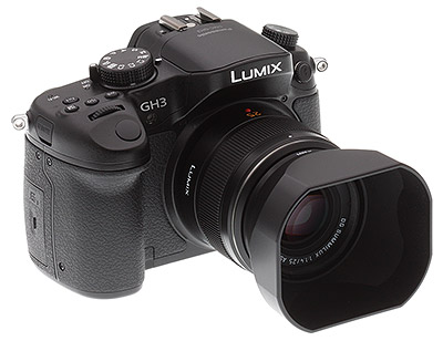 Panasonic GH3 review -- Front quarter view with lens