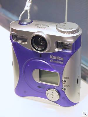 Konica's E-Mini-M digital camera, front view. Copyright (c) 2001, Michael R. Tomkins, all rights reserved. Click for a bigger picture!